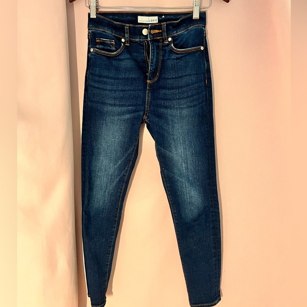 The Loft Jeans. The skinny in dark wash. Size 24